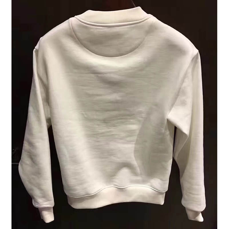 Side angle showing relaxed fit of Burberry Women Reissued Jersey Sweatshirt-White