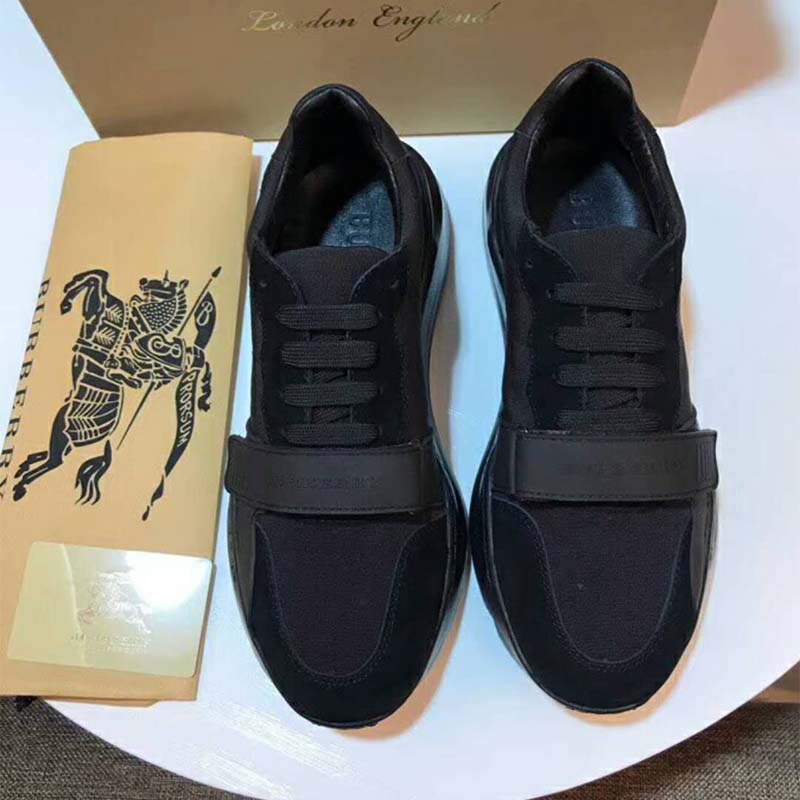 Top view showing laces and neoprene panels on Burberry black sneakers