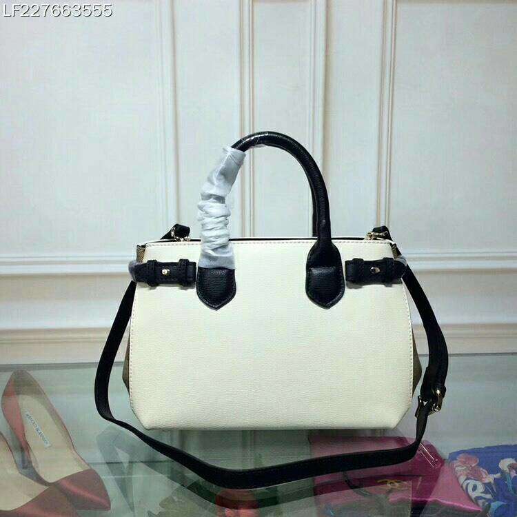 Side profile showcasing structured silhouette of Burberry Small Banner Bag