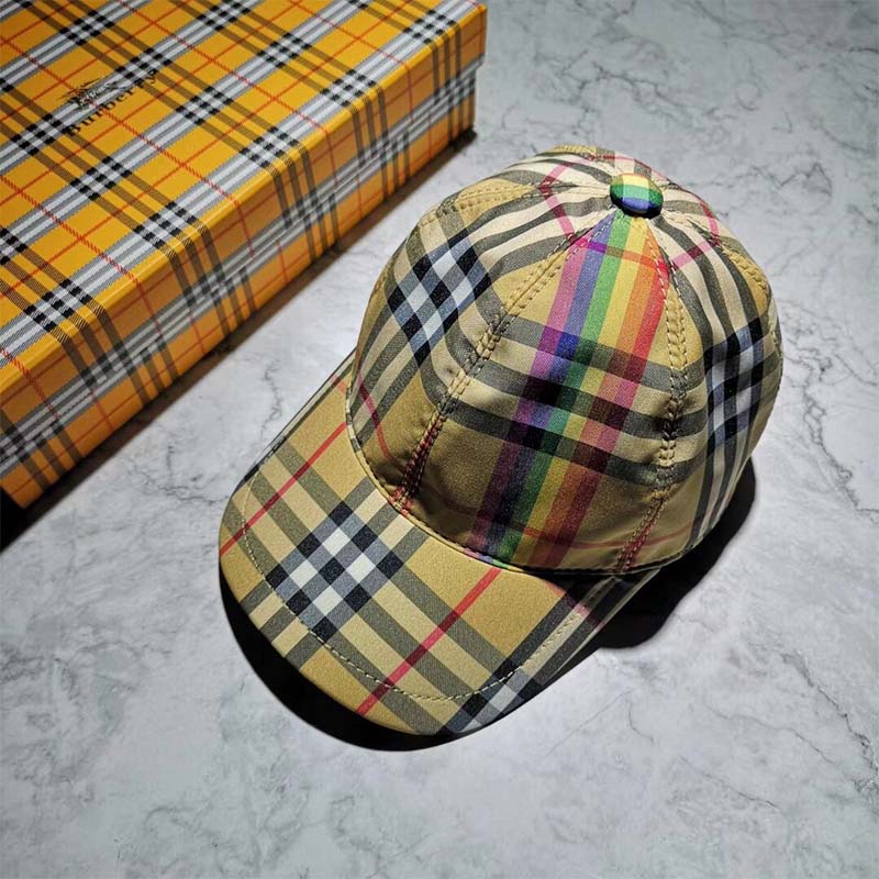 Close-up of rainbow stripe detail on Burberry baseball cap