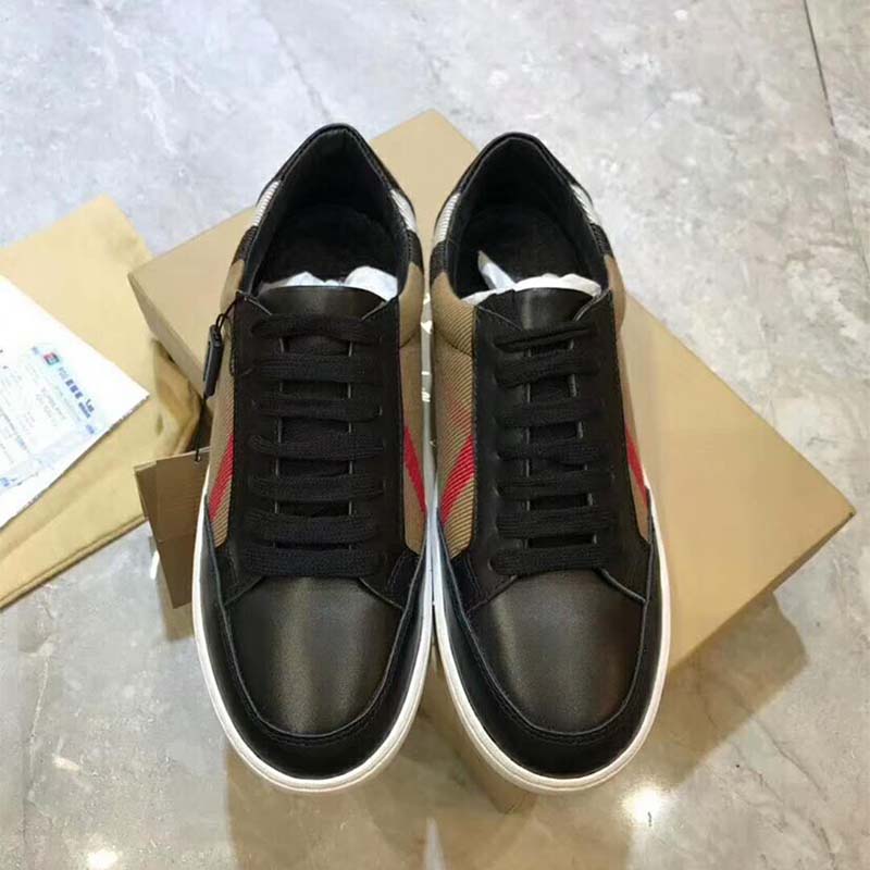 Close-up of Burberry check detail on leather sneakers heel