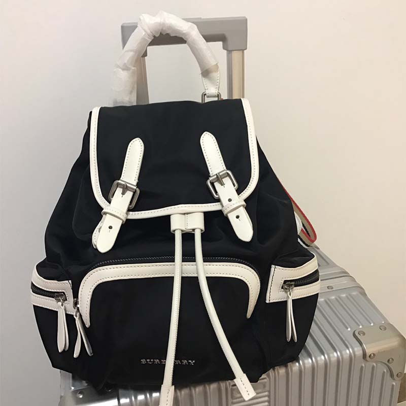 Close-up of polished silver-tone hardware on Burberry Unisex The Medium Rucksack