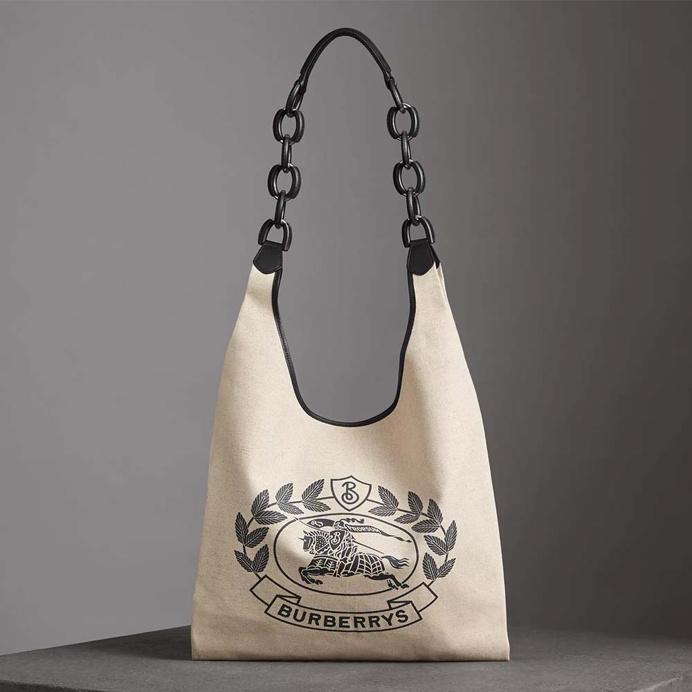 Front view of Burberry Women Medium Archive Logo Canvas and Leather Shopper in white