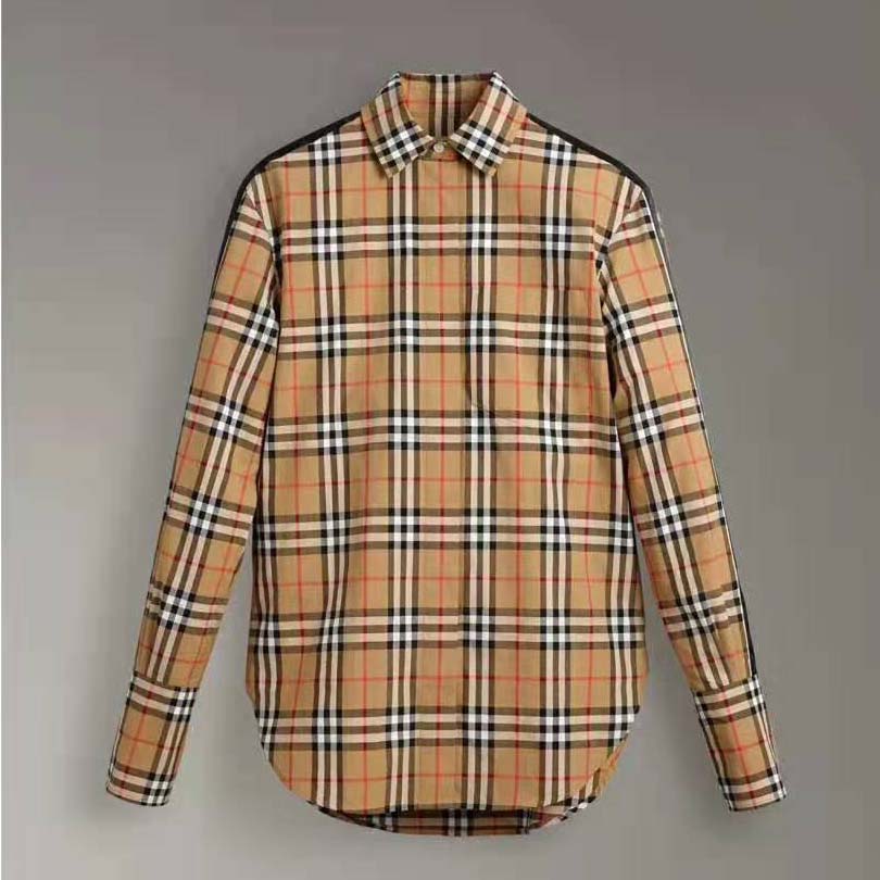 Close-up of satin fabric and vintage check on Burberry shirt
