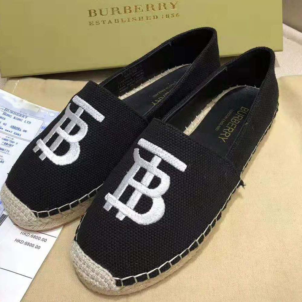 Close-up of Burberry monogram motif on espadrille leather trim