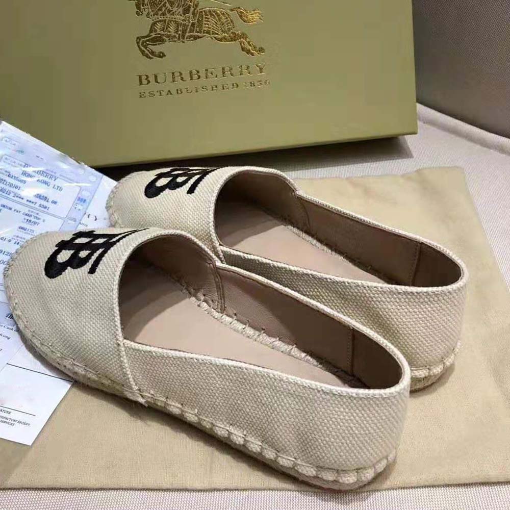 Side view highlighting cotton canvas and jute sole on Burberry espadrilles