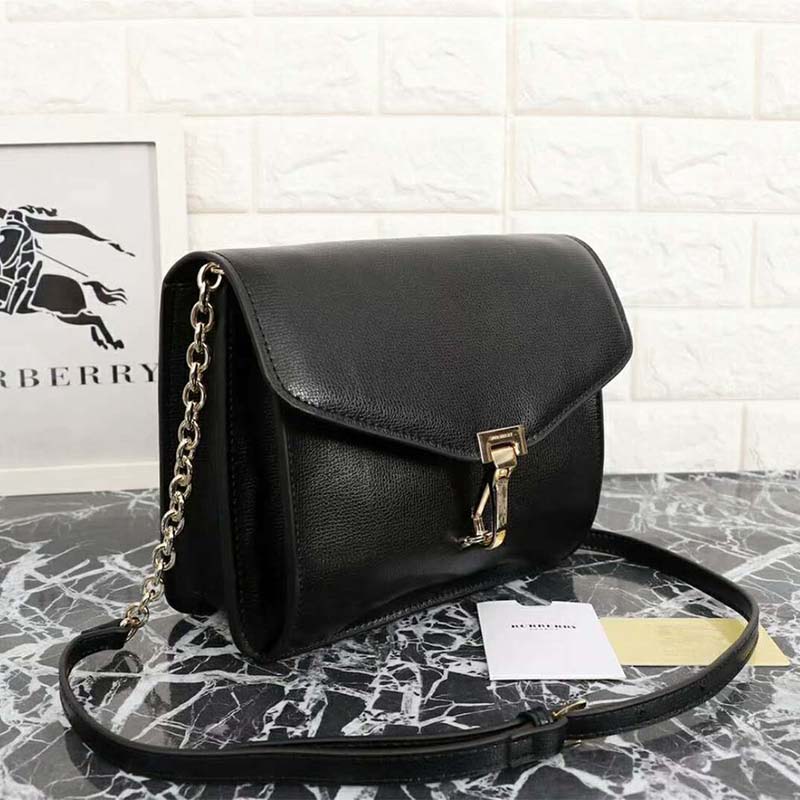 Side angle showing compact silhouette of Burberry Women Small Leather Crossbody Bag-Black