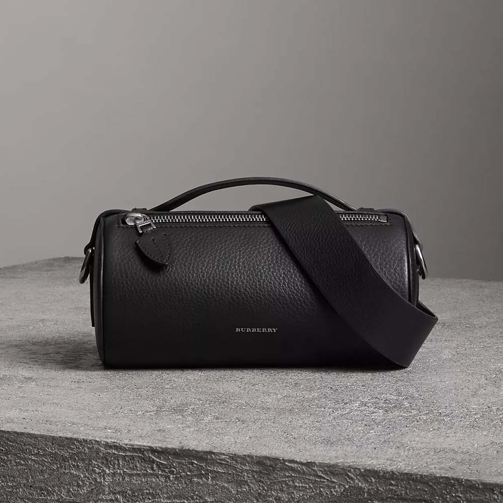 Front view of Burberry Women The Leather Barrel Bag-Black with gold hardware