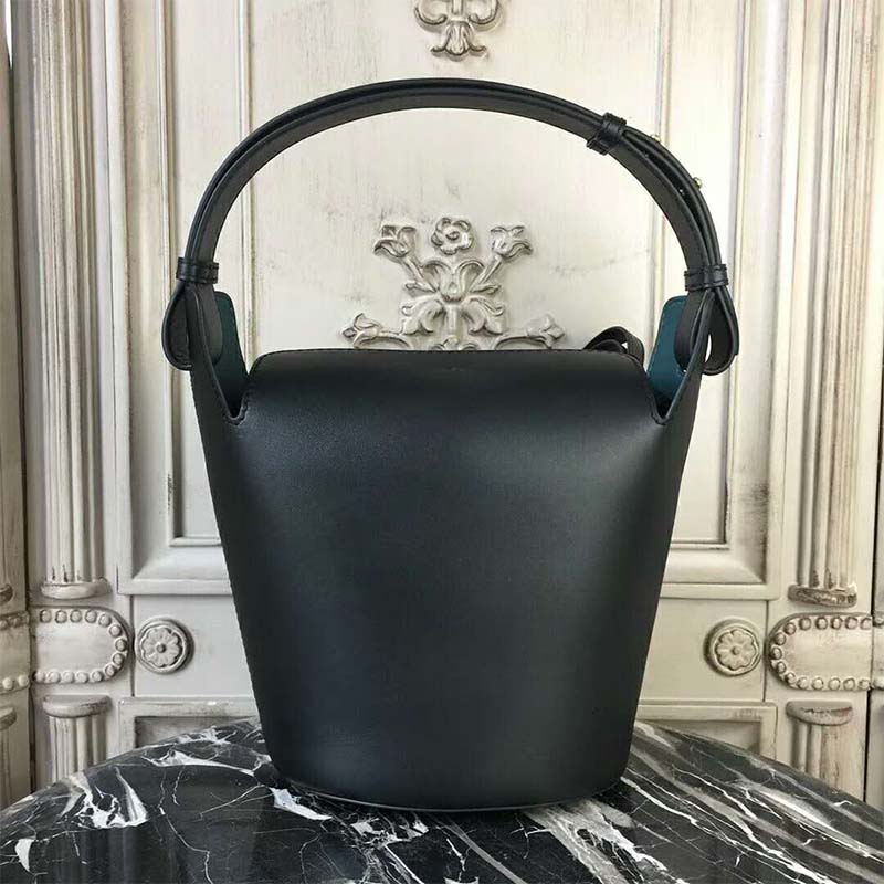 Side angle showing smooth leather texture of Burberry bucket bag