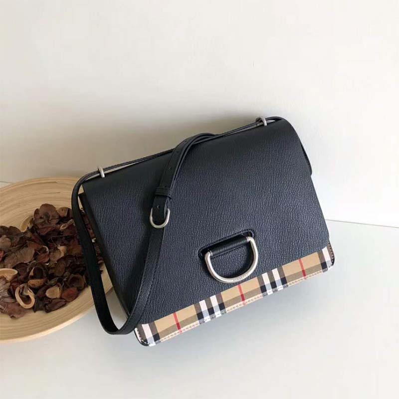 Side angle showing leather texture and vintage check on Burberry Women The Medium Vintage Check Leather D-Ring Bag-Black