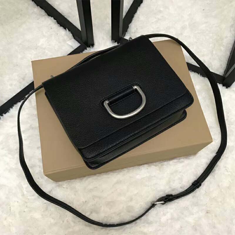 Close-up of silver D-ring hardware on Burberry Women The Small Leather D-Ring Bag-Black