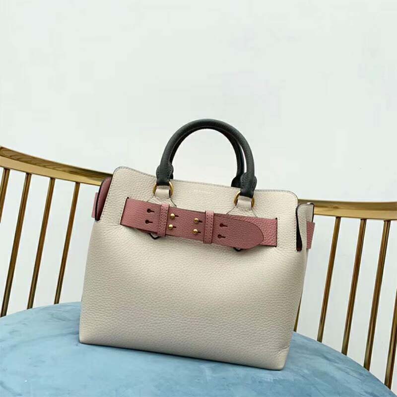 Side angle showing leather texture on Burberry Women The Small Tri-Tone Belt Bag