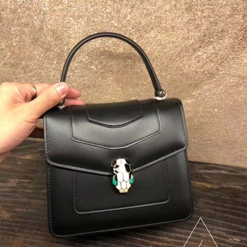 Side profile showing shape and texture of Bvlgari Serpenti Forever Medium Flap Bag