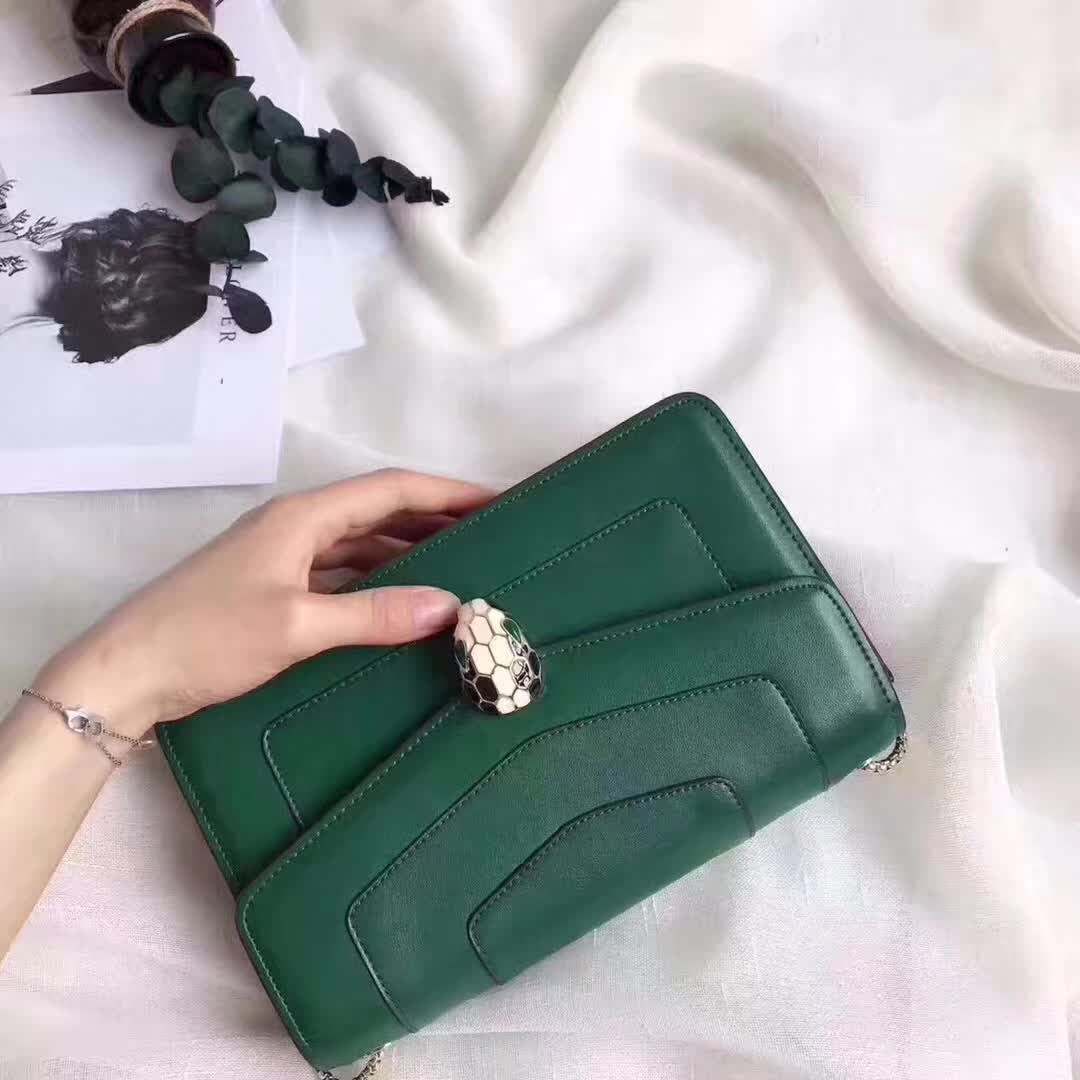 Side angle showing gold-tone chain strap on Bvlgari Serpenti Forever Green bag