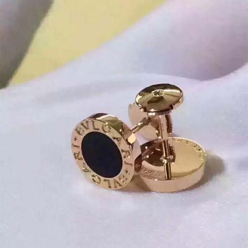 Close-up detail of black onyx stone on Bvlgari rose gold stud earring