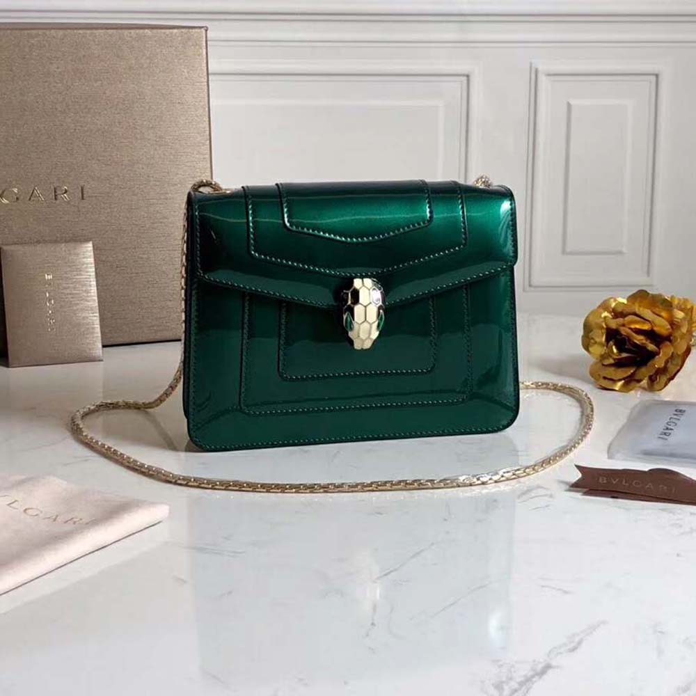 Close-up of signature serpent-head clasp on Bvlgari Women Serpenti Forever Charm-Green