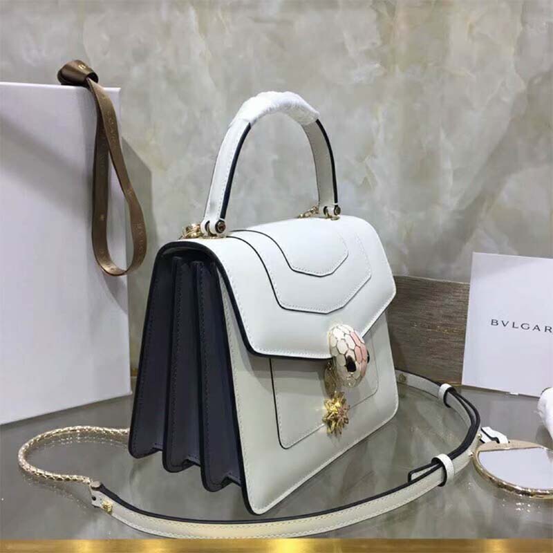 Close-up of Serpenti scale clasp on Bvlgari Women Serpenti Forever Crossbody Bag