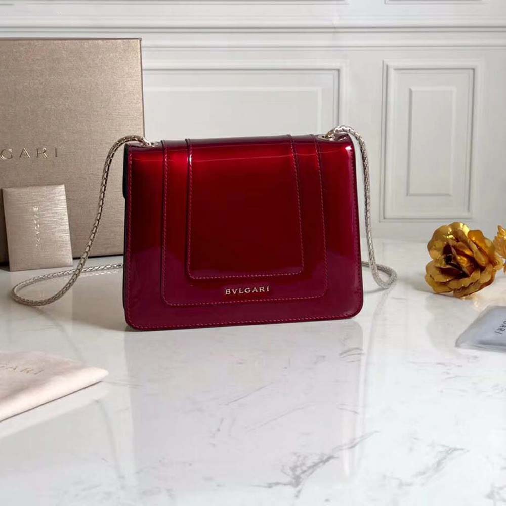 Side angle showing smooth red leather and silhouette of Bvlgari Women Serpenti Forever Flap Cover-Red