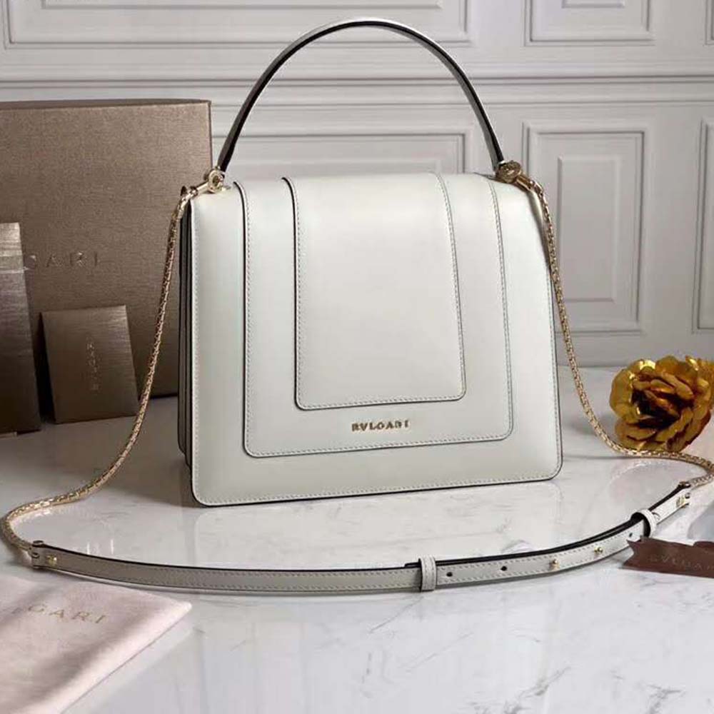 Side angle showing strap and silhouette of Bvlgari Women Serpenti Forever Flap Cover-White