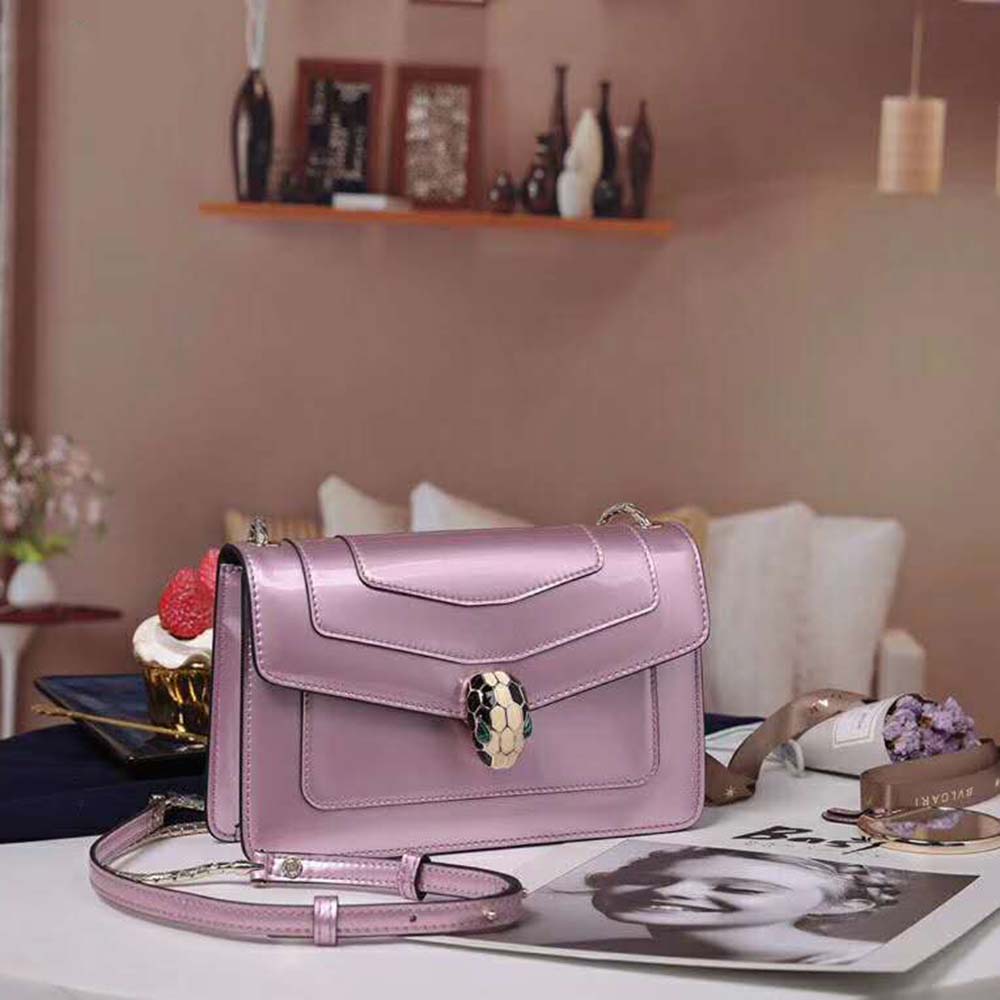 Side angle showing compact silhouette of Bvlgari Women Serpenti Forever Flap Cover