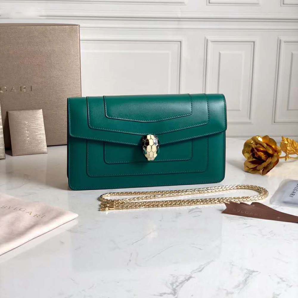 Close-up of gold serpent head clasp on Bvlgari Women Serpenti Forever Mini Bag-Green