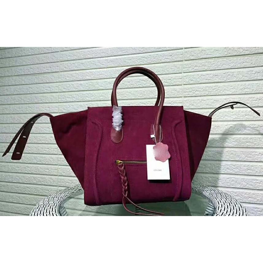 Side angle showing smooth baby calfskin texture on Celine Medium Luggage Phantom Bag