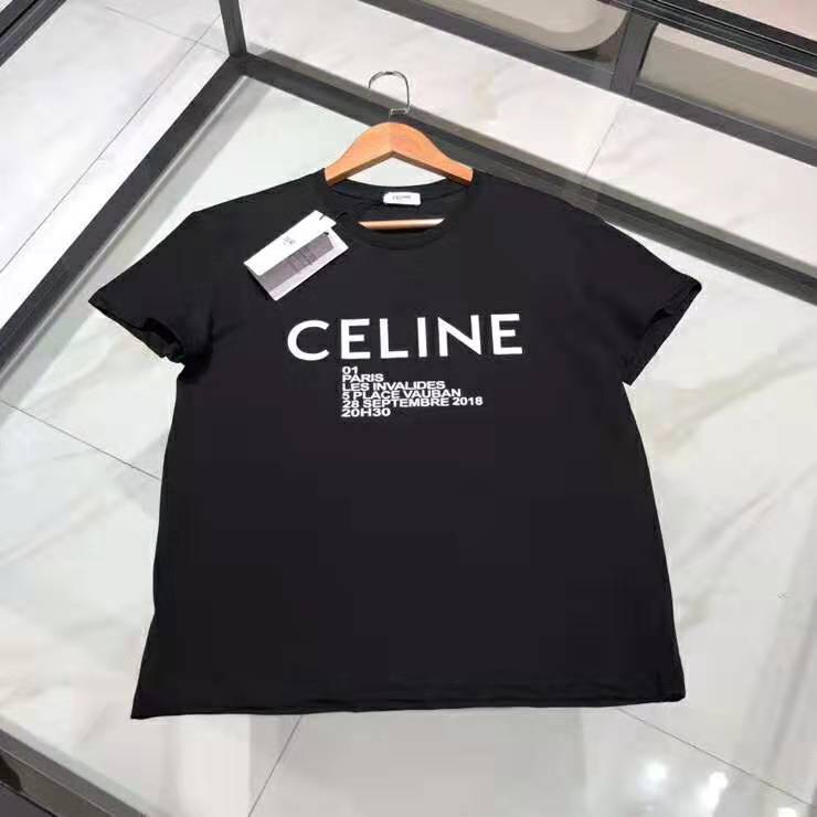 Close-up of printed Celine logo on black crew neck t-shirt