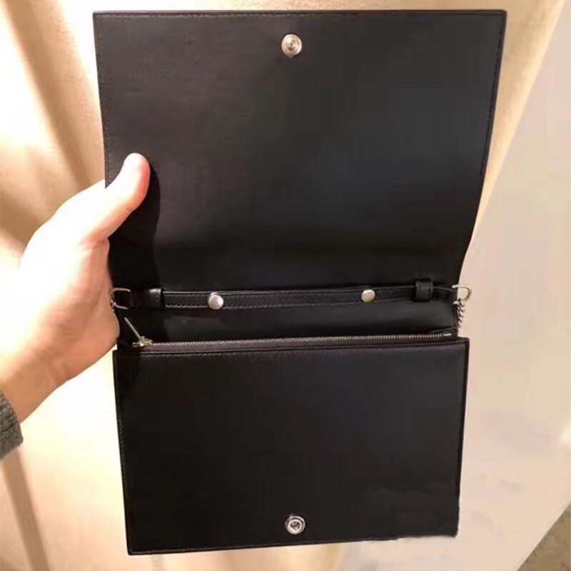 Side angle showing clutch silhouette and signature frame closure