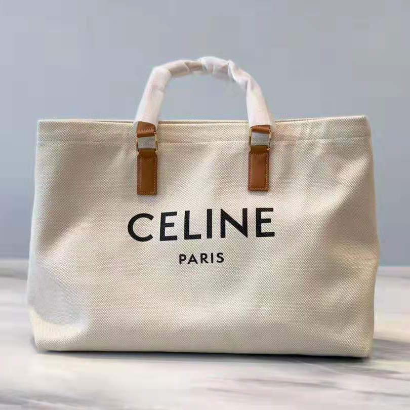 Close-up of gold-tone hardware and signature print detail on Celine bag