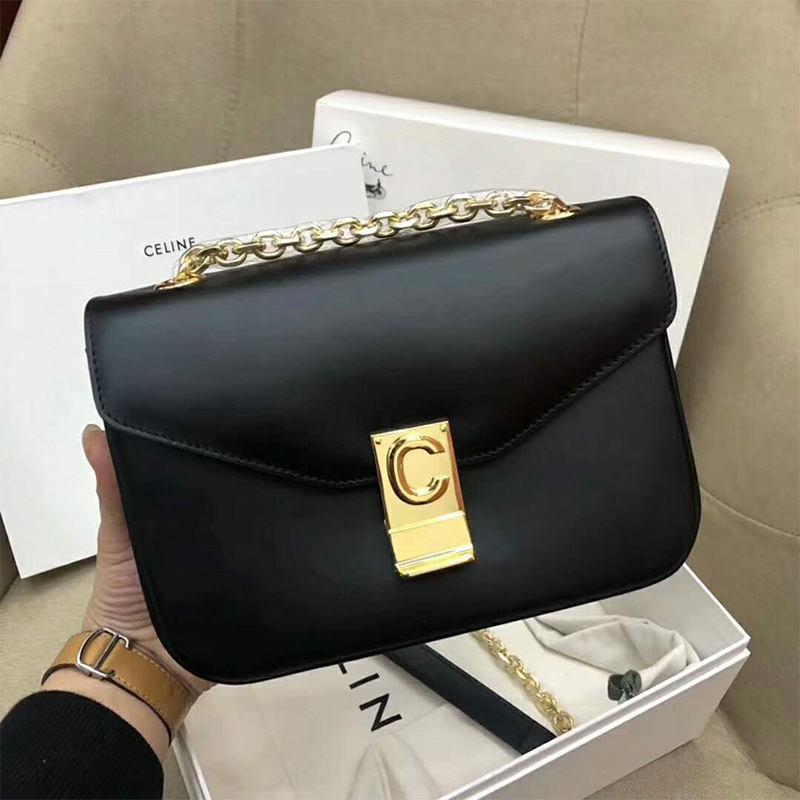 Close-up of gold C-shaped hardware on Celine Women Medium C Bag