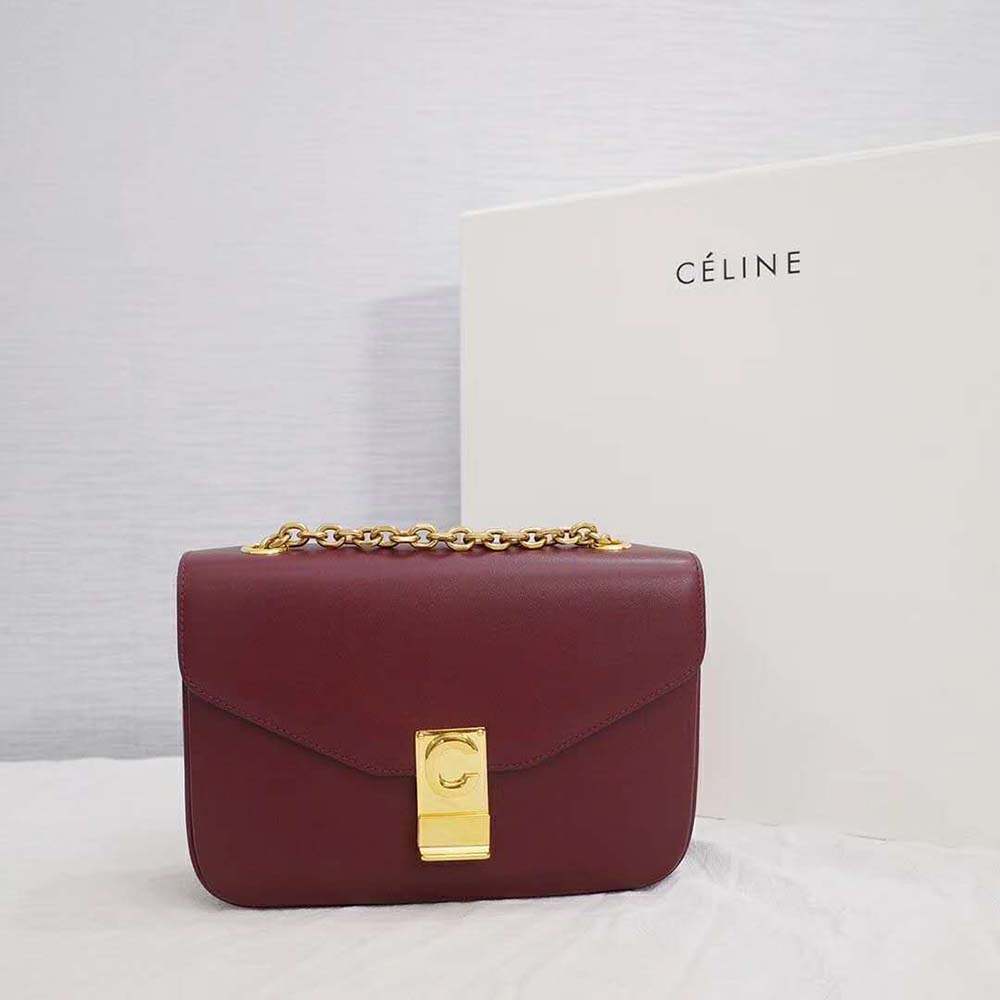 Side angle showing maroon leather texture of Celine Women Medium C Bag