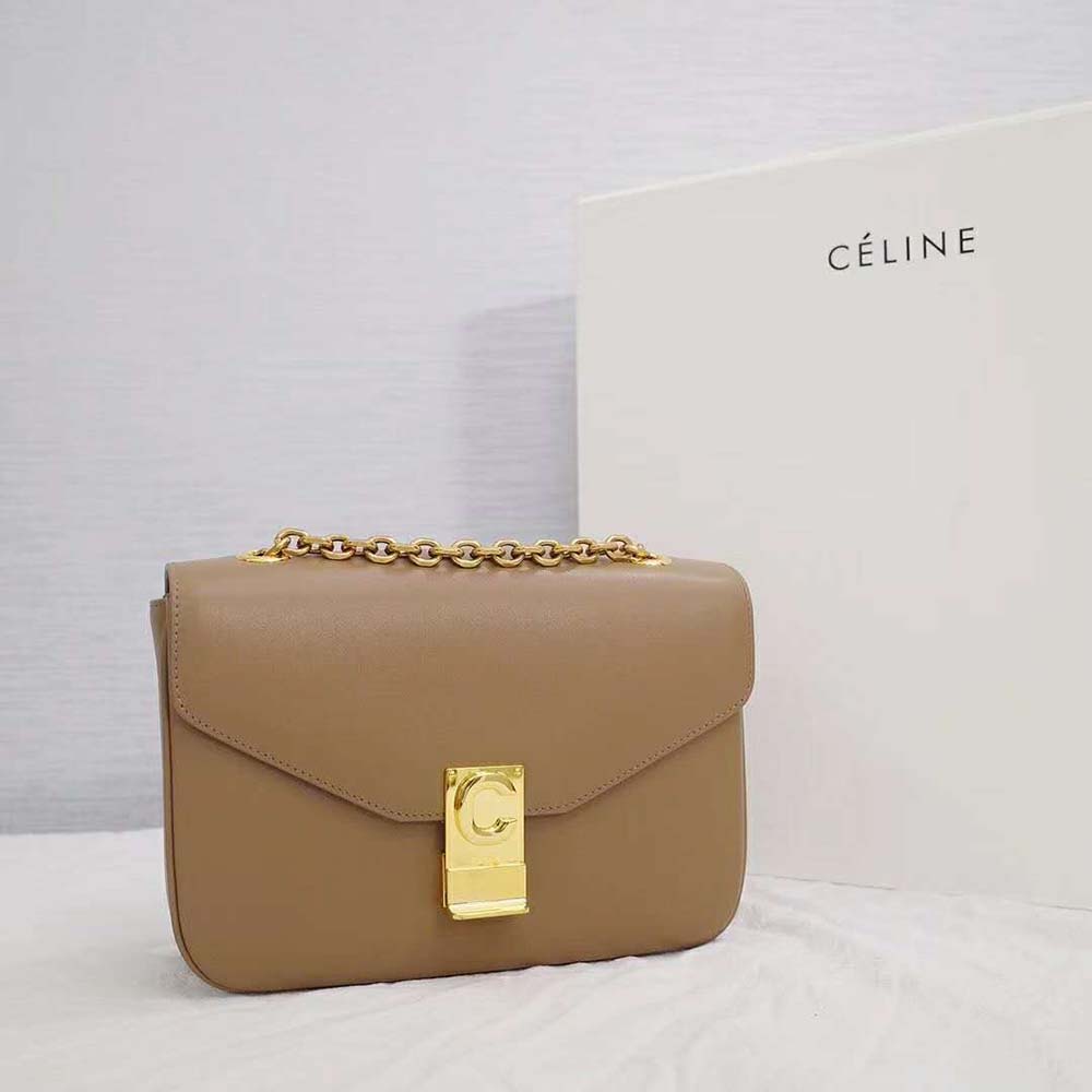 Close-up of signature C-shaped clasp on Celine Women Medium C Bag