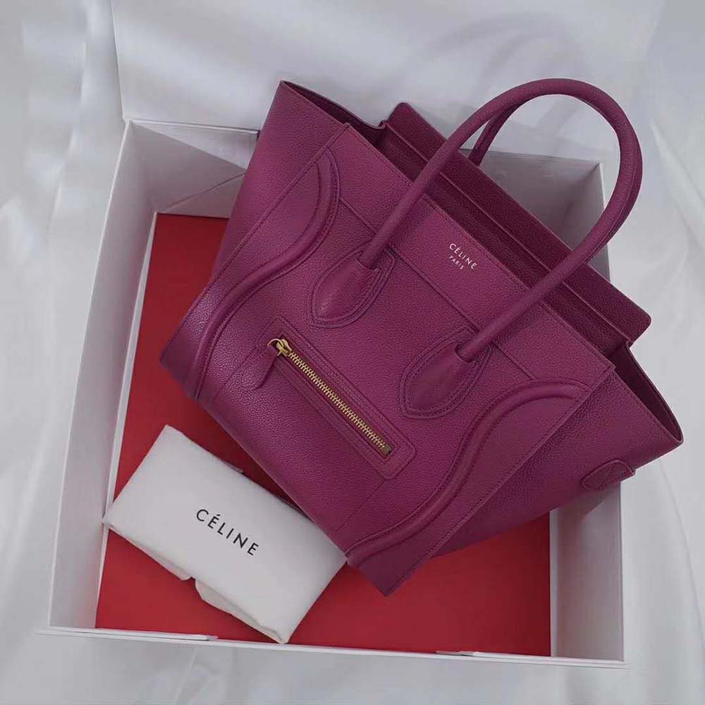 Close-up of gold-tone zipper hardware on Celine Women Micro Luggage Handbag