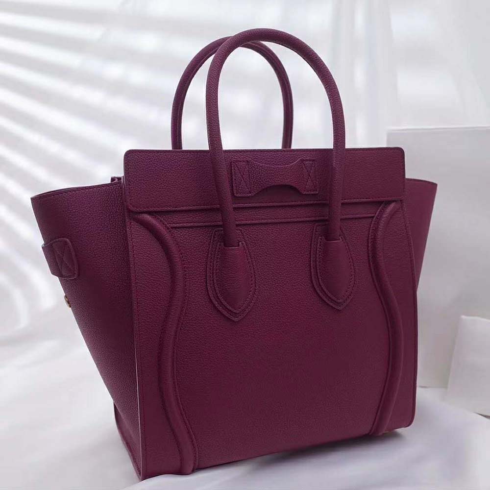 Side profile showing adjustable strap on Celine Women Micro Luggage Handbag