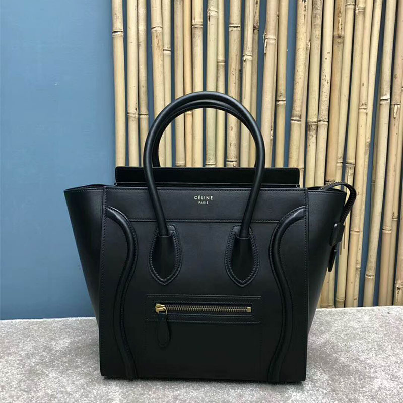 Close-up of gold-tone closure detail on Celine Women Micro Luggage Handbag