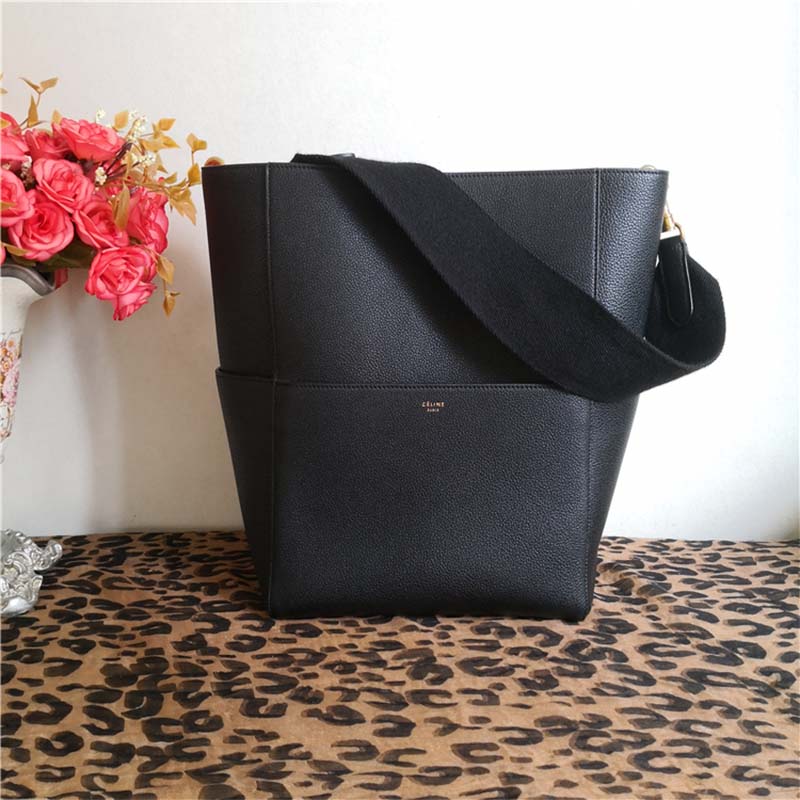Close-up of matte gold-tone hardware on Celine Women Sangle Bucket Bag