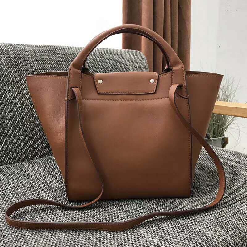 Side angle showing silhouette of Celine Women Small Big Bag brown leather