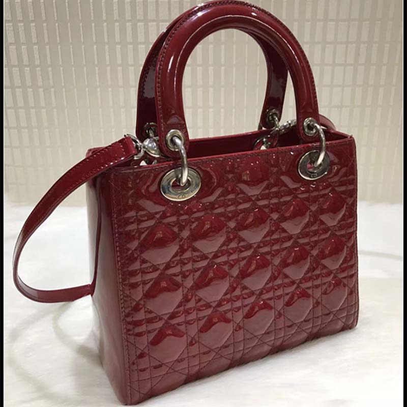 Close-up of gold hardware and quilting on Dior Lady Dior Bag