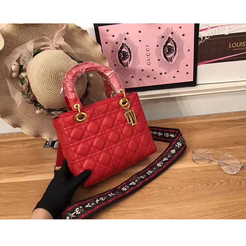 Close-up of gold-tone hardware and Dior charms on My Lady Dior Bag