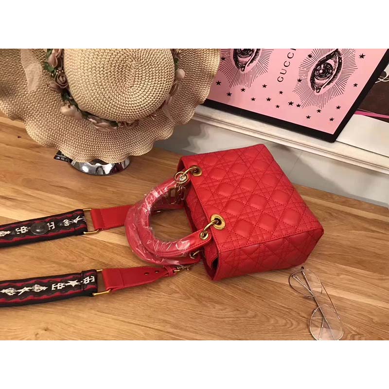 Side angle showing red lambskin leather and signature Cannage stitching