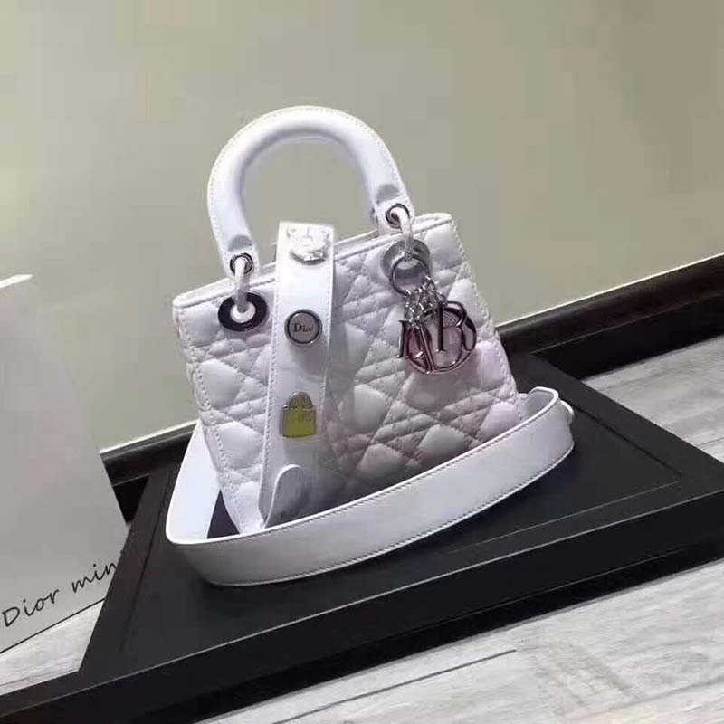 Close-up of silver hardware and Cannage quilting on My Lady Dior Bag