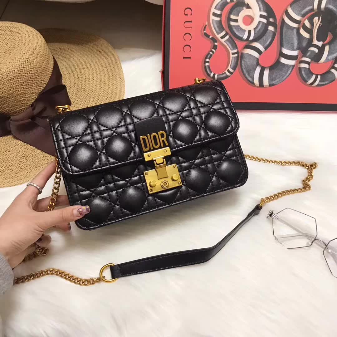 Close-up of quilted cannage lambskin and CD hardware detail