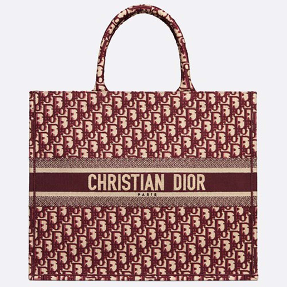 Front view of Dior Women Book Tote Dior Oblique Bag in maroon canvas
