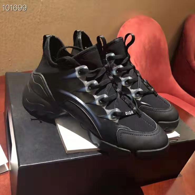 Close-up of black leather and Dior branding on sneaker heel