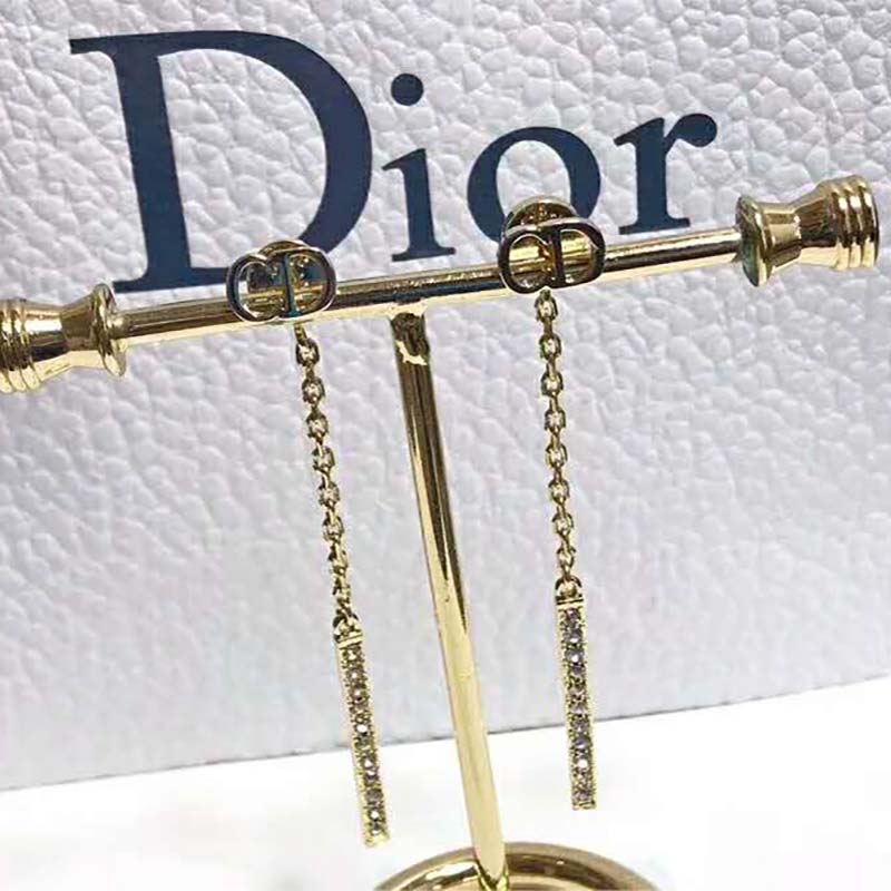 Side view showing Dior Women D-Round Earrings-Gold rounded hoop silhouette