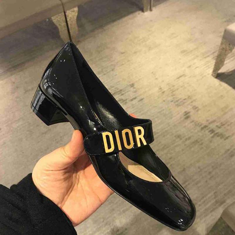 Top view showcasing sleek silhouette of Dior Baby-D Ballet Pump black patent