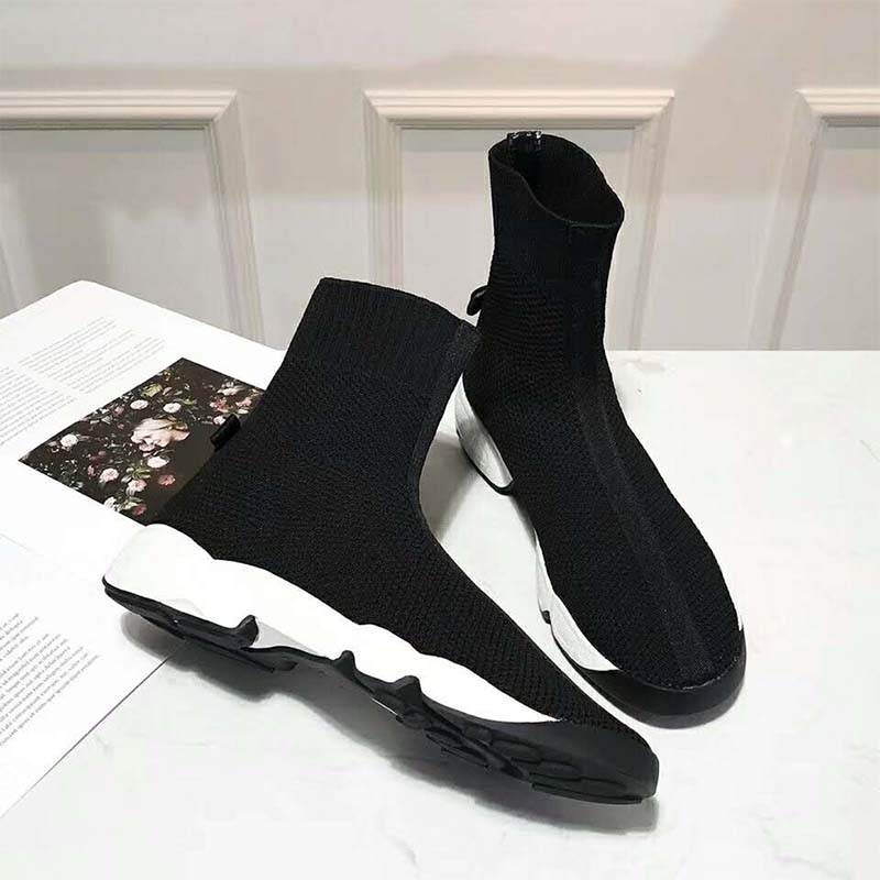 Close-up on black technical canvas and Dior logo hardware detail