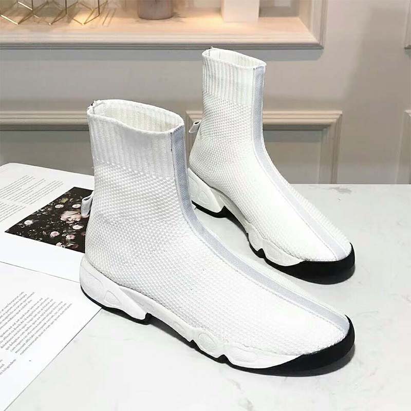 Close-up on white technical canvas and Dior logo hardware detail
