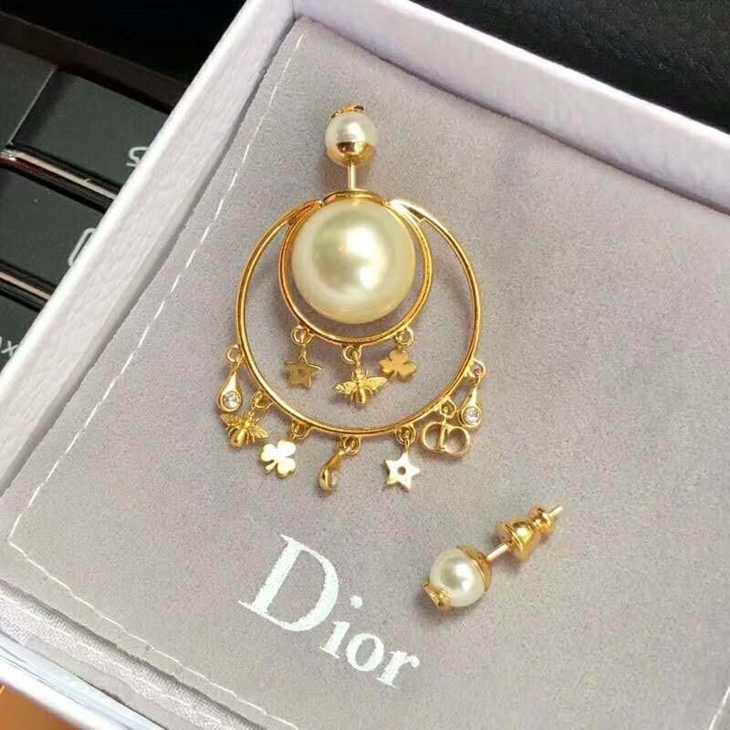 Close-up detail of gold finish and push-back closure on Dior Women Dior Tribales Earrings
