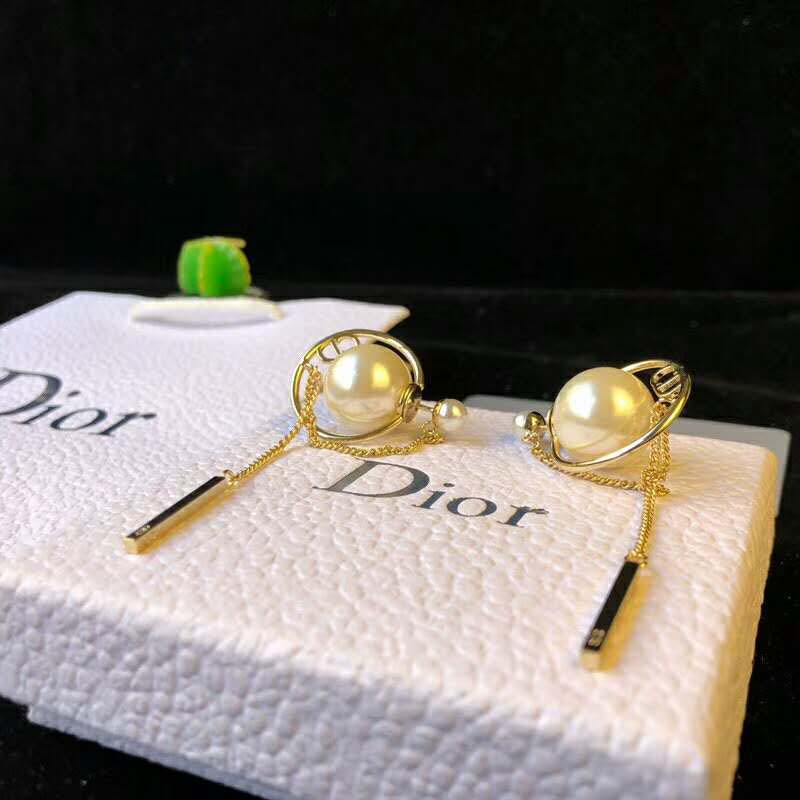 Side angle of Dior Women Dior Tribales Earrings-White with secure back closure visible